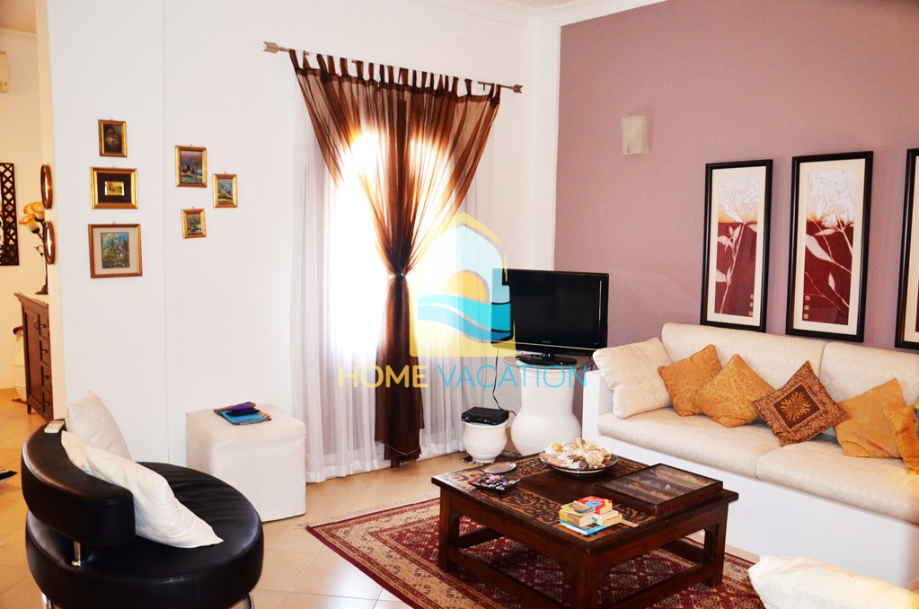 living area magawish apartment_1b401_lg